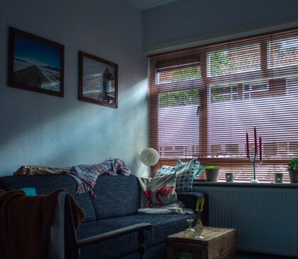 gray fabric sofa inside room